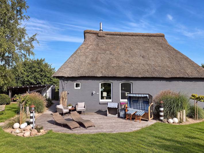 Ferienhaus für 2 Personen, mit Garten und Sauna in Mittelholstein