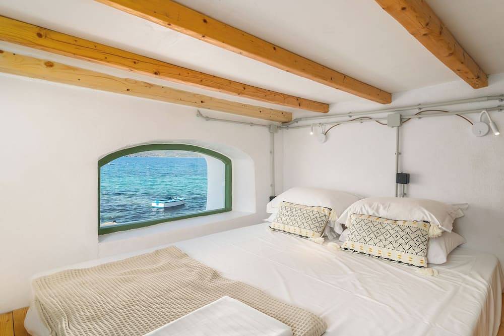 Klima Milos sea front boat house in Klima, Milos