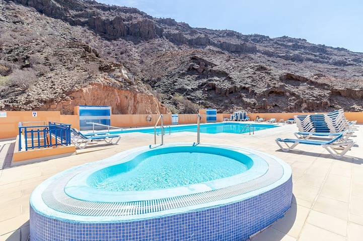 Apartamento para 4 personas, con terraza además de piscina y jardín, Se admiten mascotas en Taurito