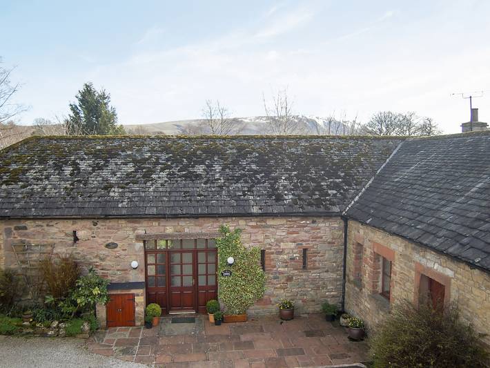 Log cabin for 7 people, with garden in Pooley Bridge