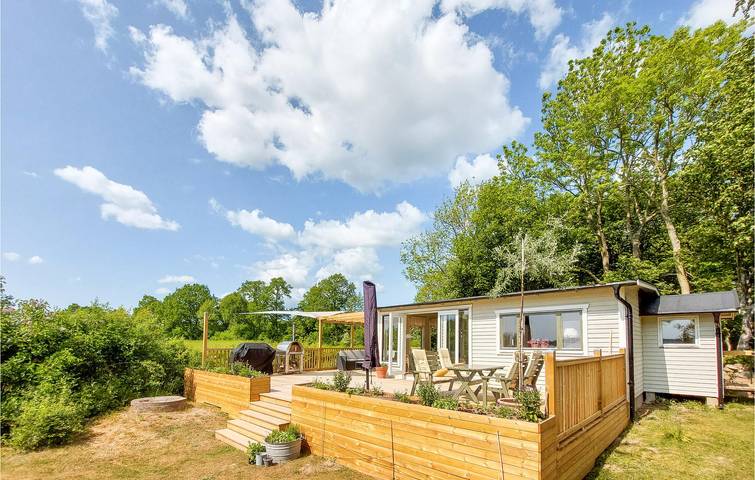Ferienhaus für 4 Personen, mit Terrasse und Garten sowie Seeblick und Ausblick - 1