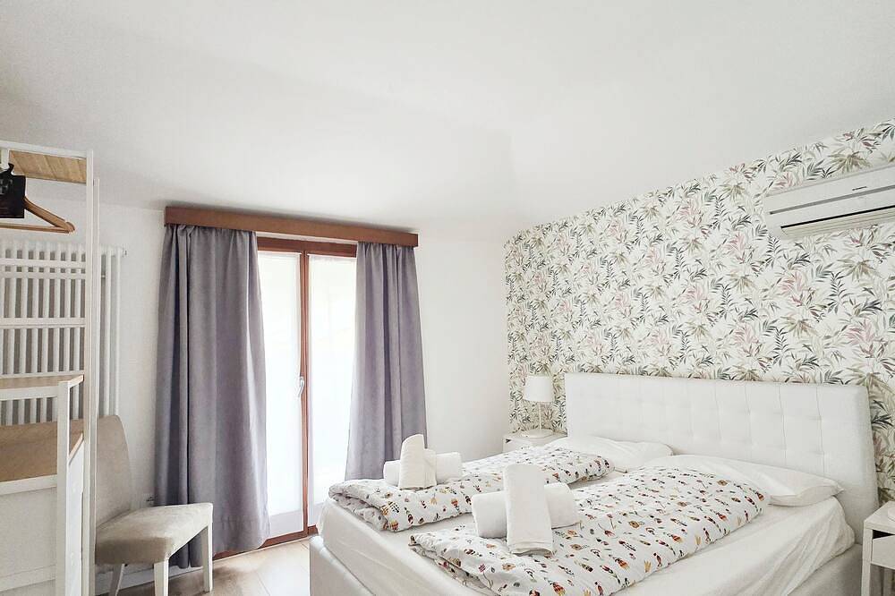 Ganze Wohnung, 🌊 Radfahren, Surfen, Entspannen | Modernes Apartment in Seenähe in Torbole, Nago-Torbole