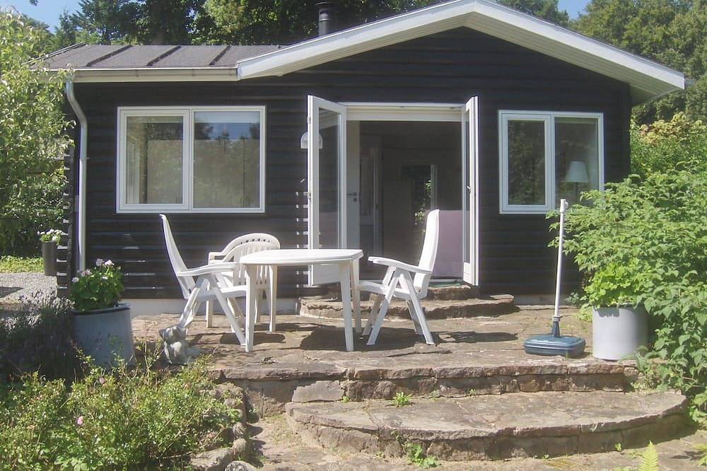 Ferienhaus aus Holz auf 1100 m2 Wald-Grundstück für 2 Personen in Kruså, Flensburger Förde (Dänemark)