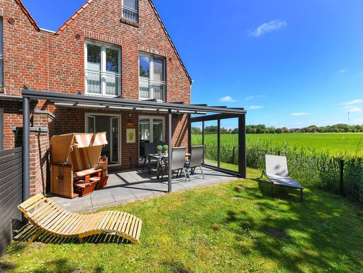 Ferienhaus für 5 Personen, mit Terrasse und Sauna in Bensersiel
