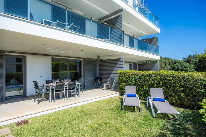 Ganze Wohnung, Immacolato piano terra con giardino privato e piscina comunnal a pinaret in Port de Pollença, Pollença