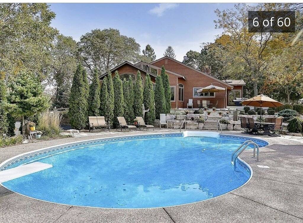 Amazing renovated acreage with heated pool + hottub in Pierce County (WI)