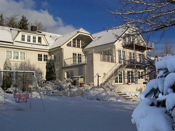Ferienwohnung für 3 Personen, mit Terrasse und Garten sowie Pool und Sauna in Sierksdorf
