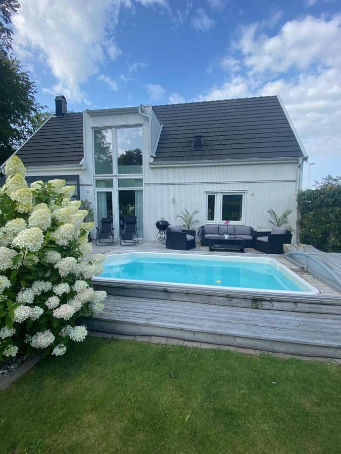 Villa für 8 Personen, mit Garten und Ausblick sowie Pool und Terrasse in Bastad - 4
