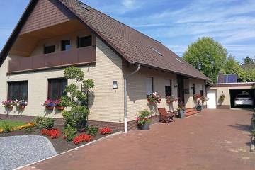 Gîte pour 2 personnes, avec jardin à Rhauderfehn