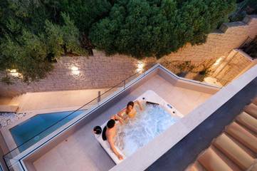 Maison d’hôte pour 2 personnes, avec vue ainsi que jardin et piscine à Villasimius