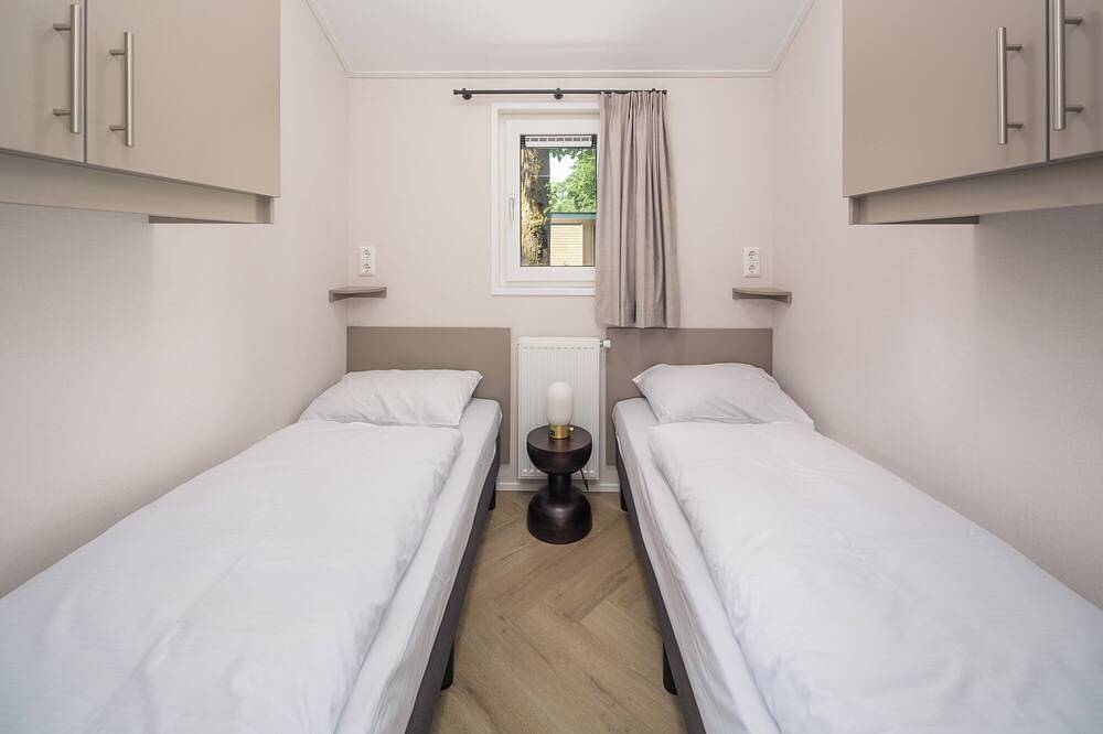 Die Doornenburg Lodge bietet eine komfortable Ferienunterkunft für 6 Personen mit modernen Annehmlichkeiten und einer eigenen Terrasse in der Veluwe. in Veluwe