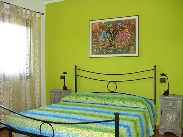 Location de vacances pour 8 personnes, avec jardin ainsi que balcon et vue sur l’océan à Capoliveri