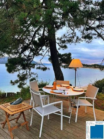 Cottage pour 8 personnes, avec jardin et vue dans Plage Cala Rossa