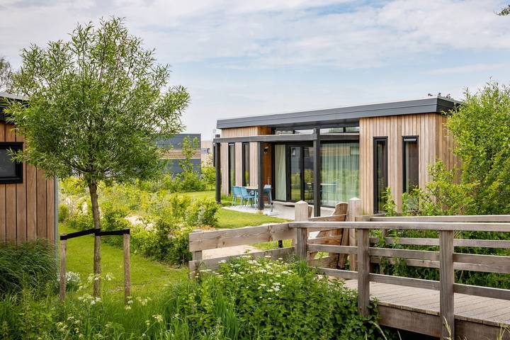 Ferienhaus für 4 Personen, mit Balkon/Terrasse und Terrasse sowie Garten