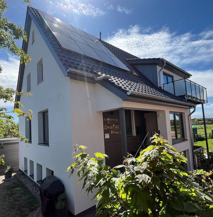 Ferienwohnung für 4 Personen, mit Balkon und Garten sowie Sauna