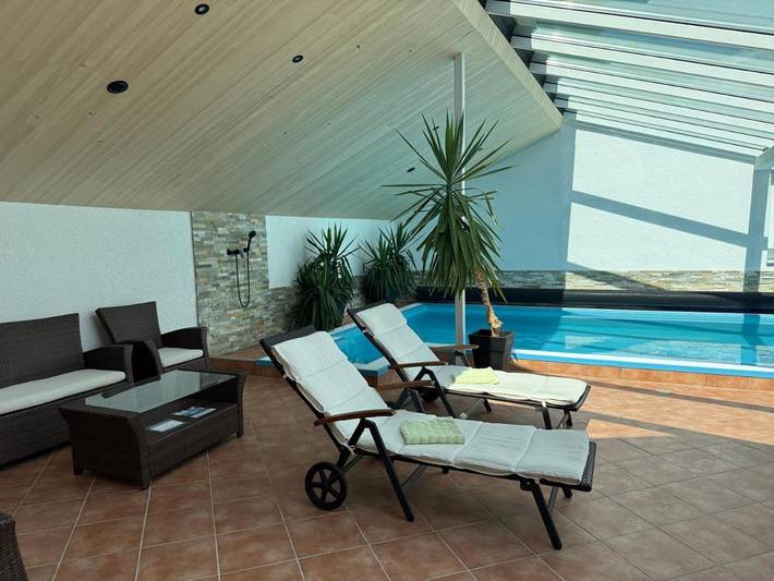 Ferienwohnung für 4 Personen, mit Pool und Terrasse sowie Ausblick und Sauna