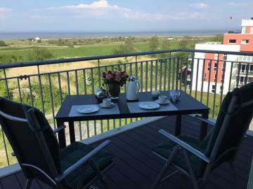 Ferienwohnung für 4 Personen, mit Sauna und Balkon sowie Ausblick in Schillig