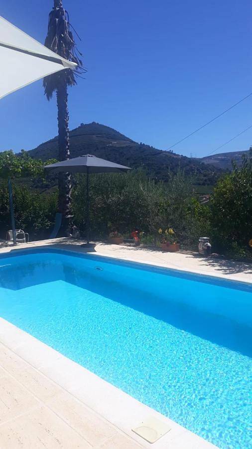 Casa de férias para 4 pessoas, com Terraço e Jardim e ainda Piscina and Vista para o lago em Pinhão