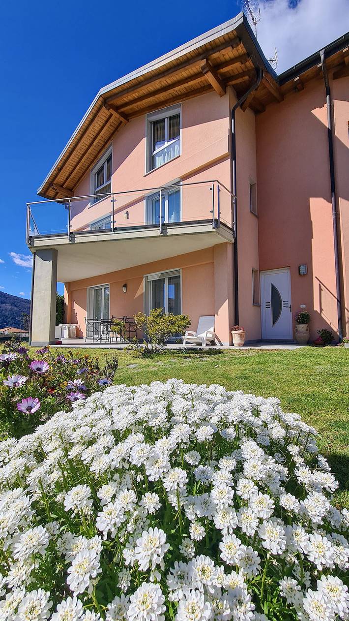 Ferienwohnung für 4 Personen, mit Terrasse und Garten sowie Ausblick und Seeblick