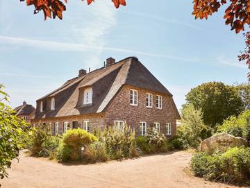 Ferienhaus für 5 Personen, mit Terrasse und Garten sowie Sauna in Utersum