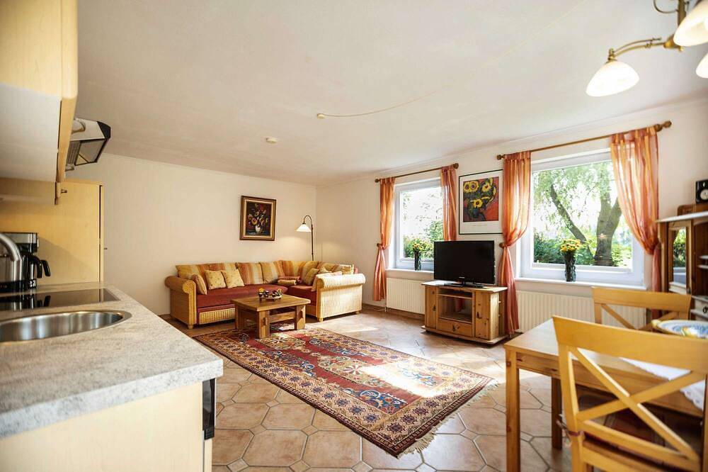 Ganze Wohnung, Die Ferienwohnung 04 Sonnenschein hat eine eingezäunte Süd-West Terrasse in Krummsee, Malente