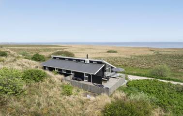 Ferienhaus mit Meerblick für 8 Personen, mit Whirlpool und Garten sowie Sauna und Terrasse, mit Haustier am Ringkøbing Fjord