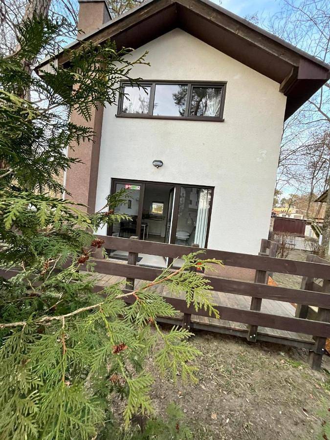 Ferienhaus für 4 Personen, mit Ausblick und Sauna sowie Seeblick und Garten, mit Haustier