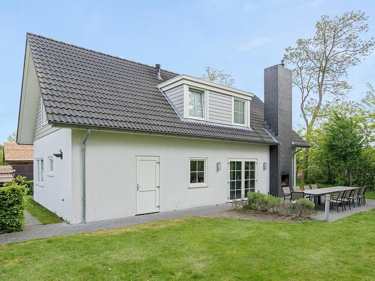 Moderner Lodge-Aufenthalt mit Teichblick in Baarle-Nassau, Nordbrabant