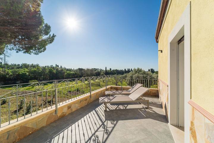 Casa vacanze "Capriccio Mediterraneo" con vista mare, aria condizionata, terrazza e giardino in Ottava, Sassari