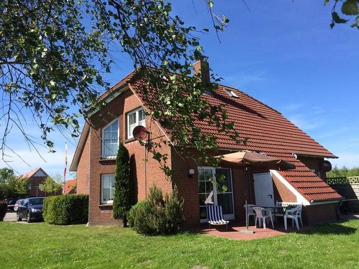 Ferienhaus für 4 Personen, mit Terrasse und Garten sowie Ausblick in Norddeich