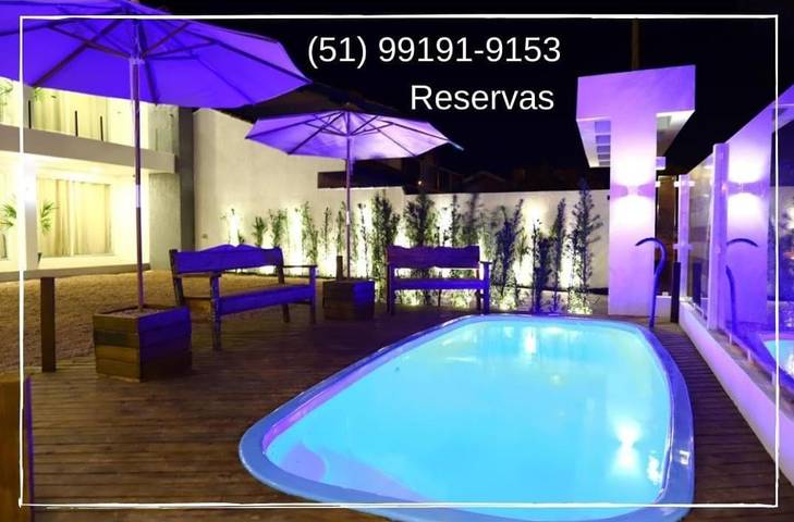 Casas e apartamentos de temporada para 12 pessoas, com balcão e vista e ainda piscina and jardim em Tramandaí