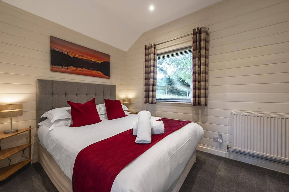 Cosy Woodland Lodge close to Pitlochry in Pitlochry, Perthshire