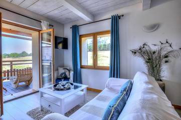 Cottage pour 2 personnes, avec piscine et jardin, adapté aux familles à Andon