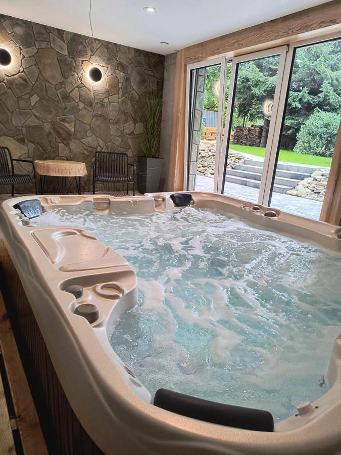 Ośrodek wypoczynkowy dla 6 osób, z ogród i balkon oraz sauna i jacuzzi w Szczyrk