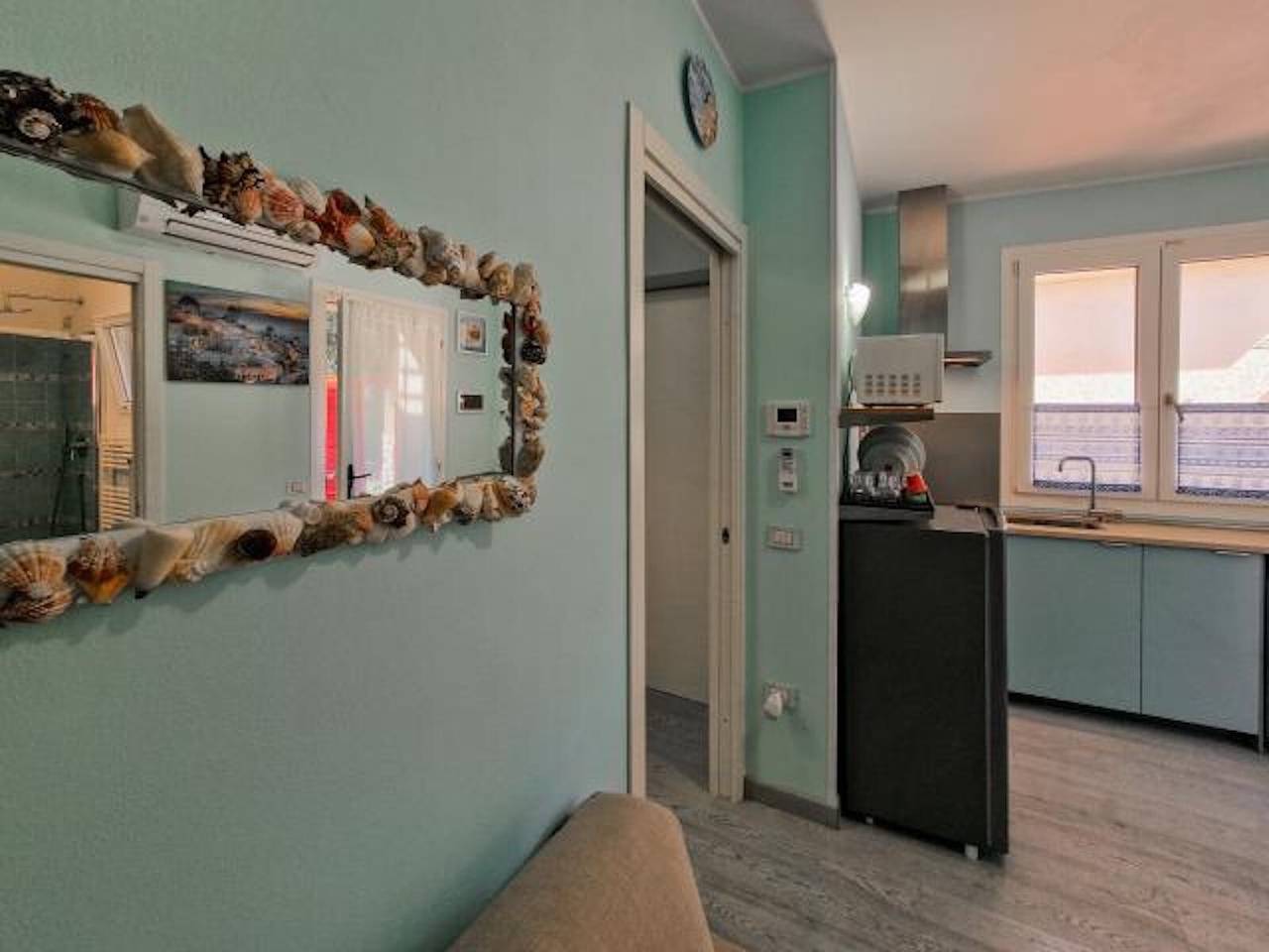 Appartement 'Villa Galatea La Conchiglia' met zeezicht en privé terras, foto 8