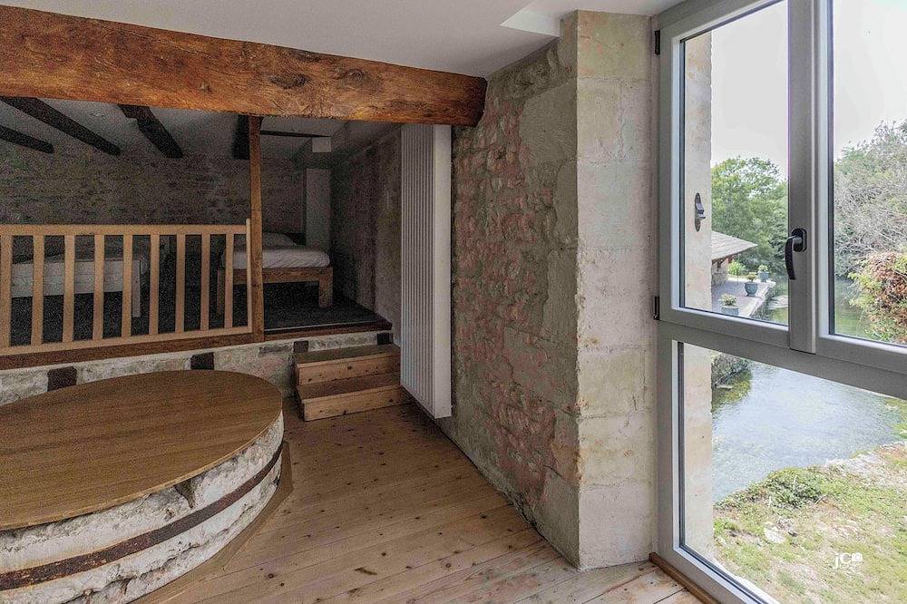 Le Petit Courault: Renovated mill, sleeps 35 comfortably in the heart of nature. in Pamproux, Niort region