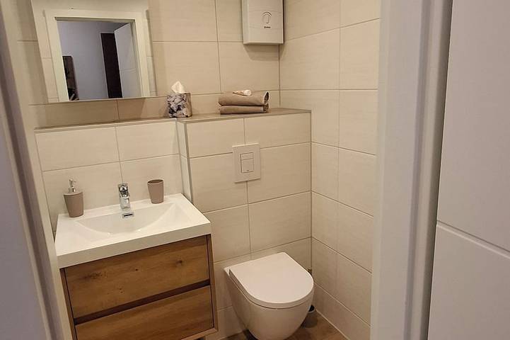 Appartement entier, \"Meerliebe\" Vacation Rental Right on Lake Steinhude, Featuring a Sauna, Balcony, and Parking Space in Wunstorf, Lac de Steinhude