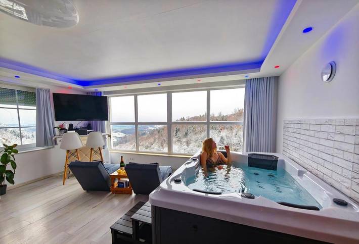 Appartement de vacances pour 2 personnes, avec piscine et sauna ainsi que jacuzzi et terrasse