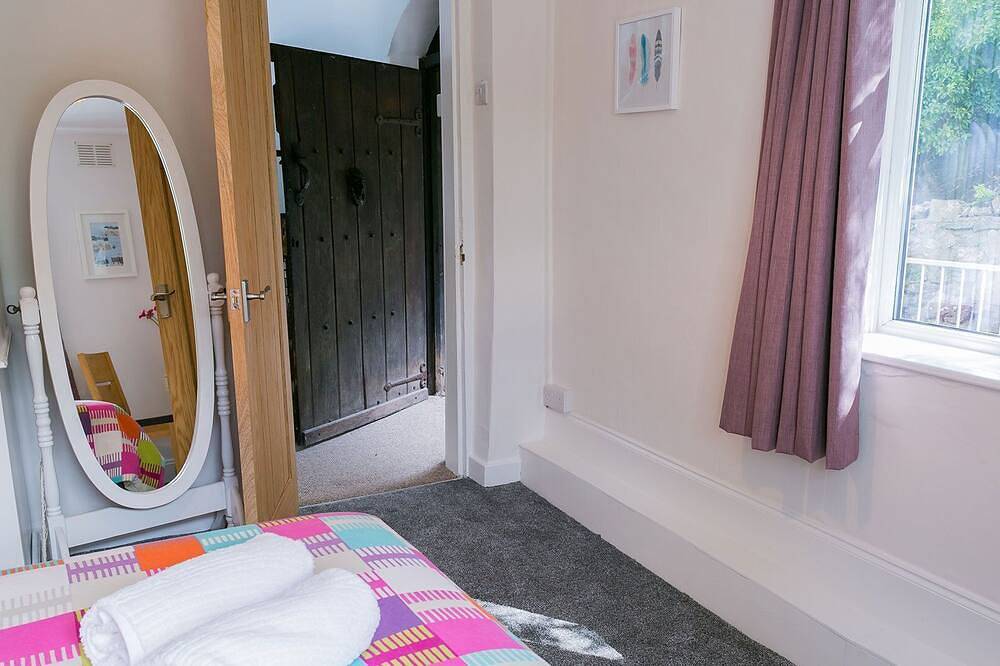 Entire apartment, Ty'r Ardd -  a ground floor bedroom that sleeps 7 guests  in 4 bedrooms in Red Wharf Bay, Isle of Anglesey