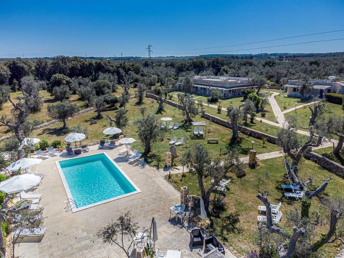 Appartamento per 5 persone, con piscina e panorama nonché giardino, adatto a famiglie con bambini a Giurdignano