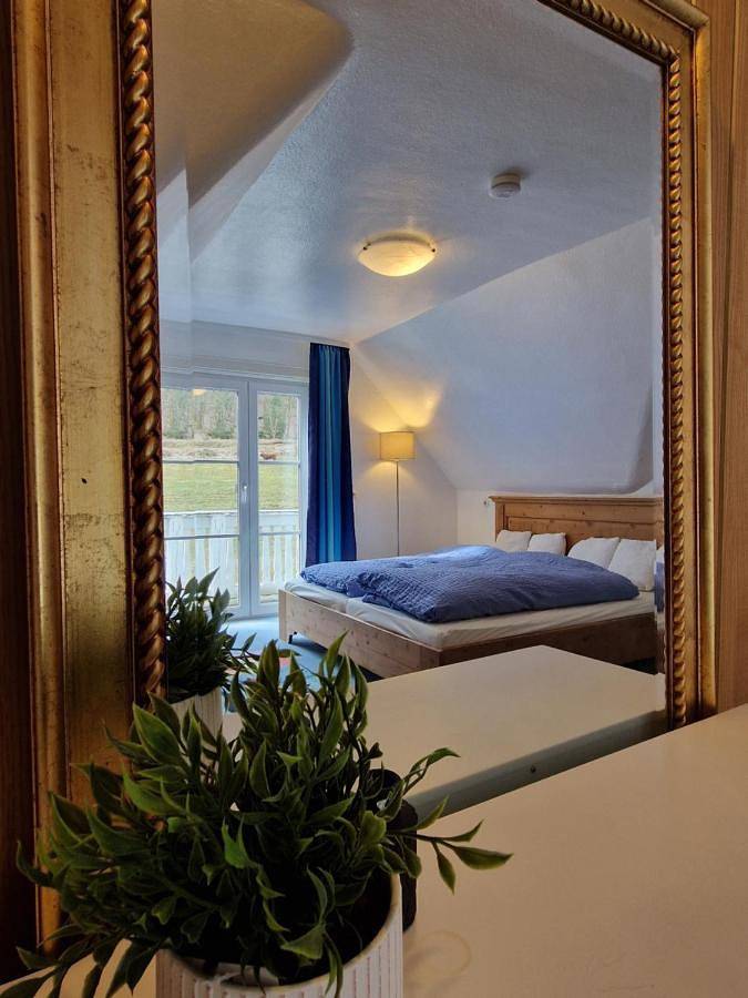 Ferienwohnung für 4 Personen, mit Balkon und Garten sowie Ausblick und Sauna in Eberbach