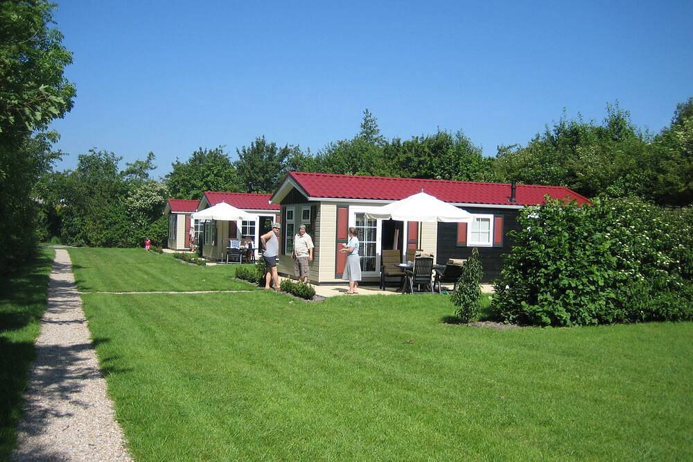 Gemütliches Chalet mitten im Grünen in der Nähe des Banjaardstrandes in De Banjaard, Kamperland