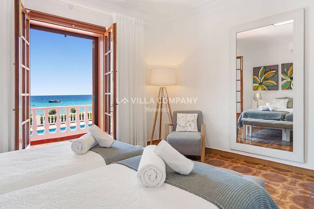 Beachfront Bliss: Captivating Views & Sleeps 9 - Your Perfect Villa Getaway in Santo Tomas, Es Migjorn Gran