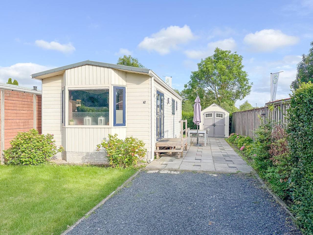 Zentral gelegenes Chalet in einem Park mit Pool in Niederländische Nordsee