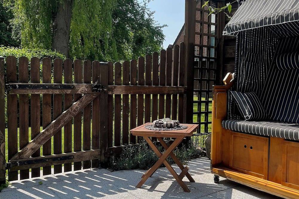 Ganze Wohnung, Gemütliche Ferienwohnung im Hamptons-Stil mit großer Terrasse in Vitzdorf, Fehmarn