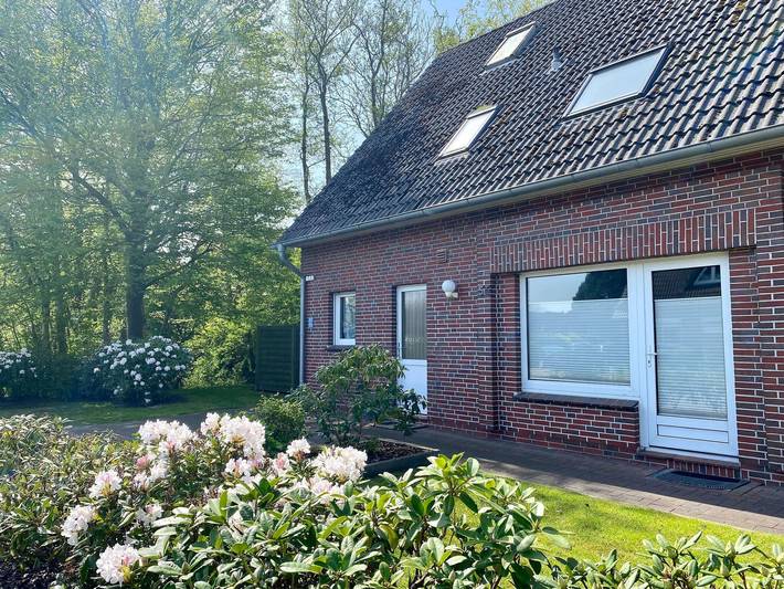 Ferienwohnung für 4 Personen, mit Terrasse und Garten in Burhaversiel