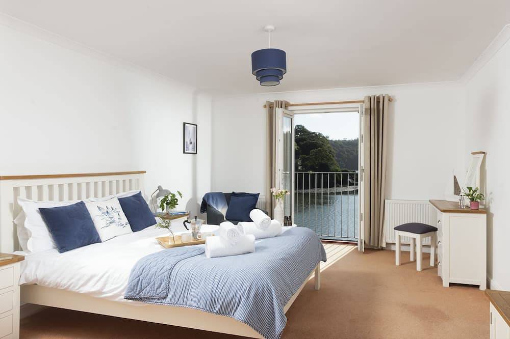Dieses Ferienhaus liegt direkt am Wasser in der Malpas Marina in Cornwall