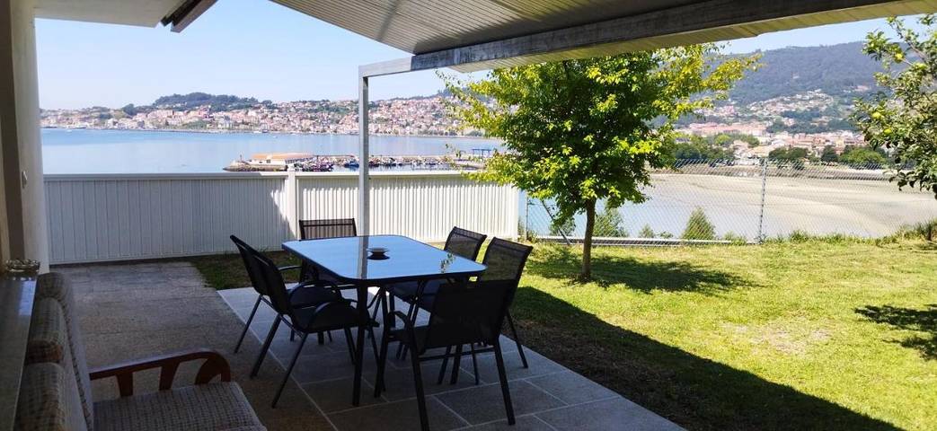 Apartamento para 10 personas, con jardín y vistas, Familias con niños en Moaña