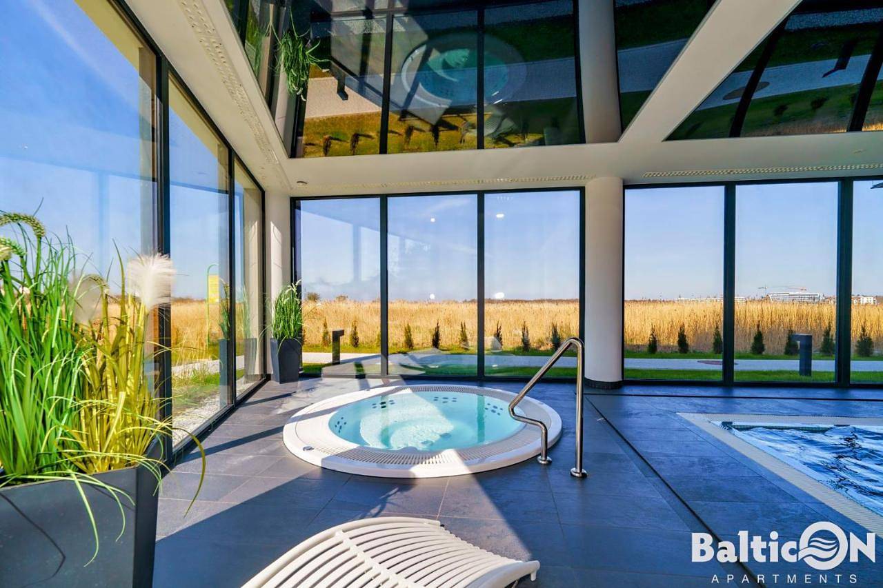 Apartamenty Balticon Westin House -luksusowy 70m2 , basen pool, sauna, parking inklusive in Kołobrzeg, Baltic Sea Pomerania