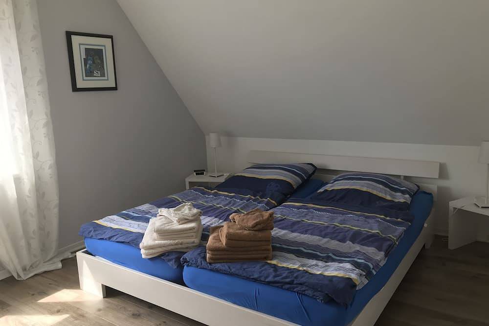 Vier sterren in de haven: modern gerenoveerd vissershuis direct aan de haven Ditzumer in Ditzum, Jemgum